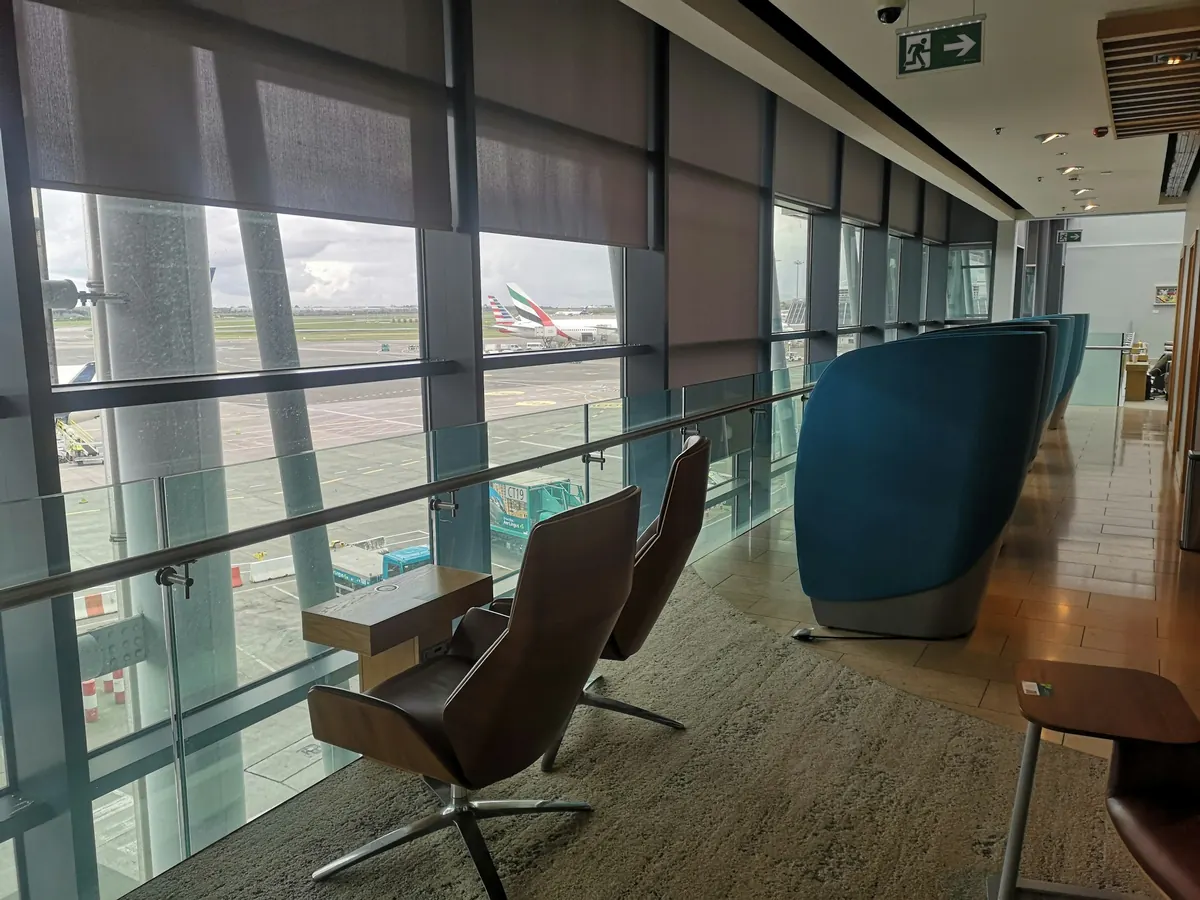 Lounge windows looking onto parked business jets